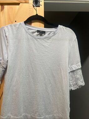 J. Crew light blue t shirt with detailed lace size x small elegant
